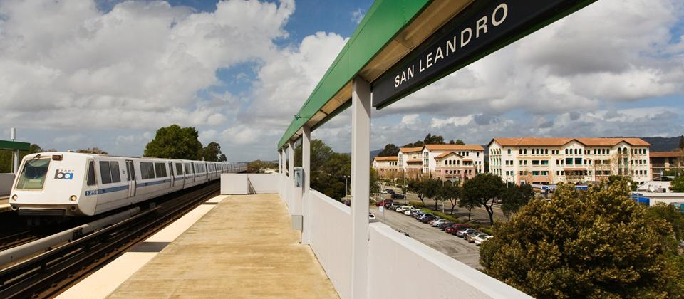A Train Stands on the Tracks at a Station
