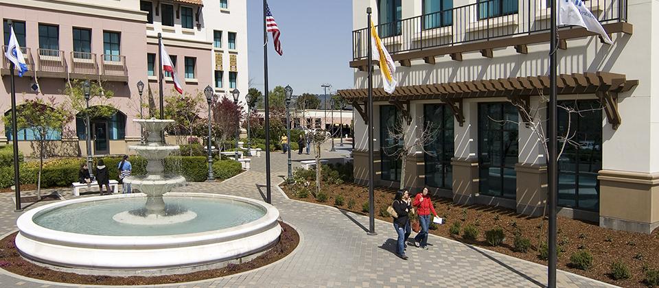 A Fountain Stands Prominently in a Plaza